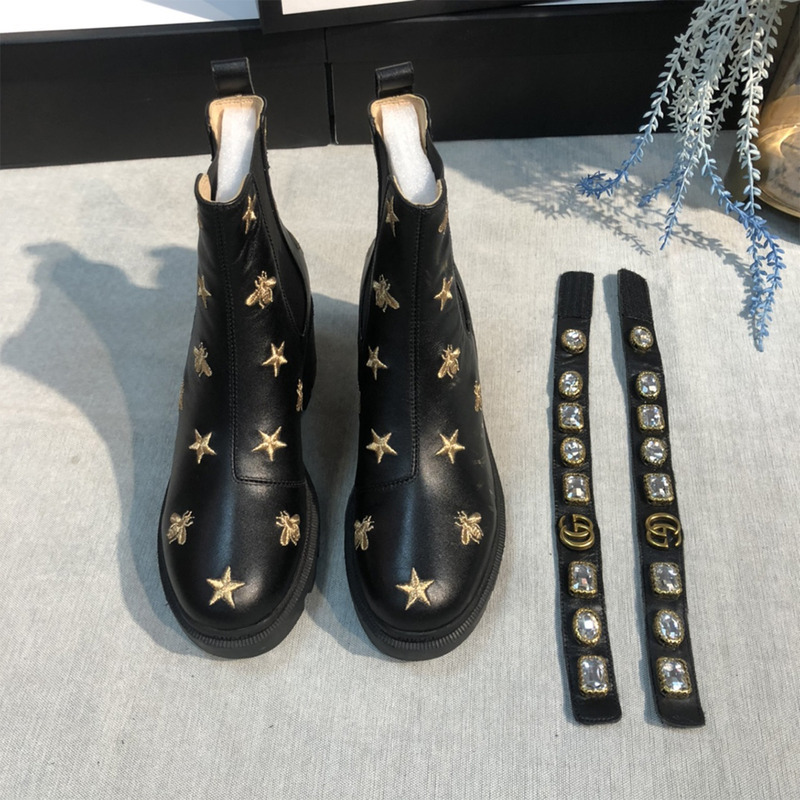G*u*i embroidered leather ankle boot with belt