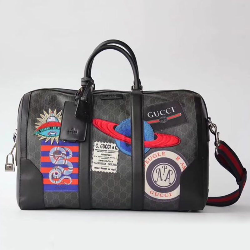 courrier G*u*i suitcase