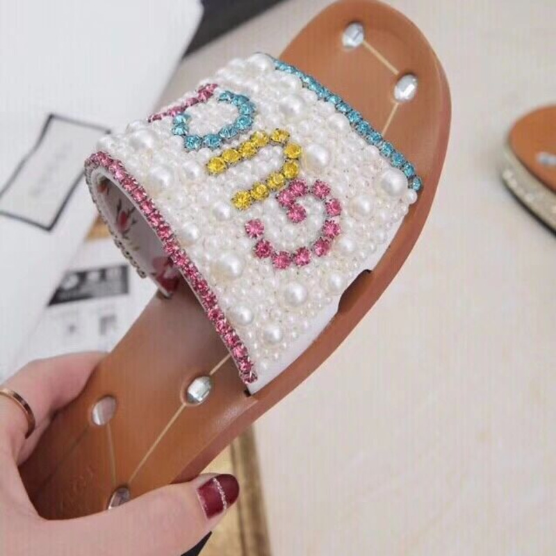 G*u*i slides with pearl