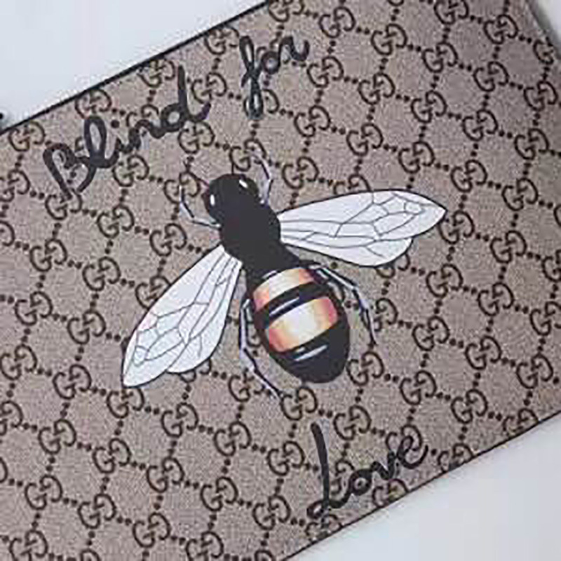 G*u*i pouch with bee print