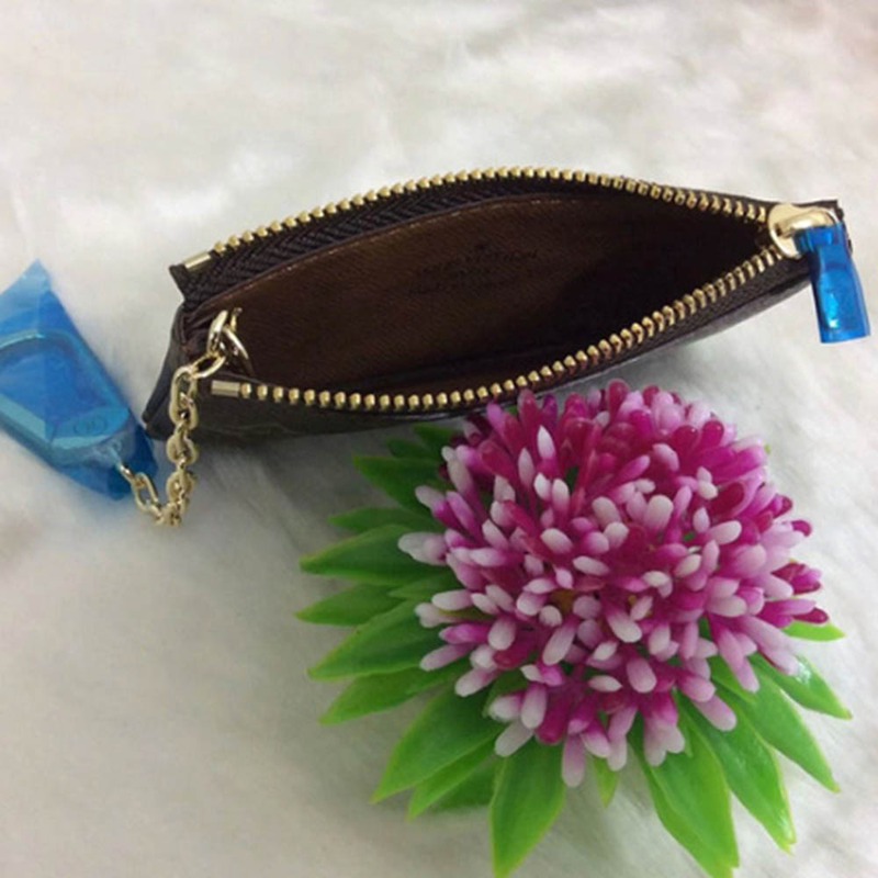 l**is V*t*n coin pouch brown monogram